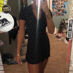 Black mini dress with white flowers